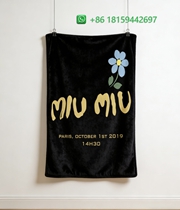 Miumiu Throw Blankets